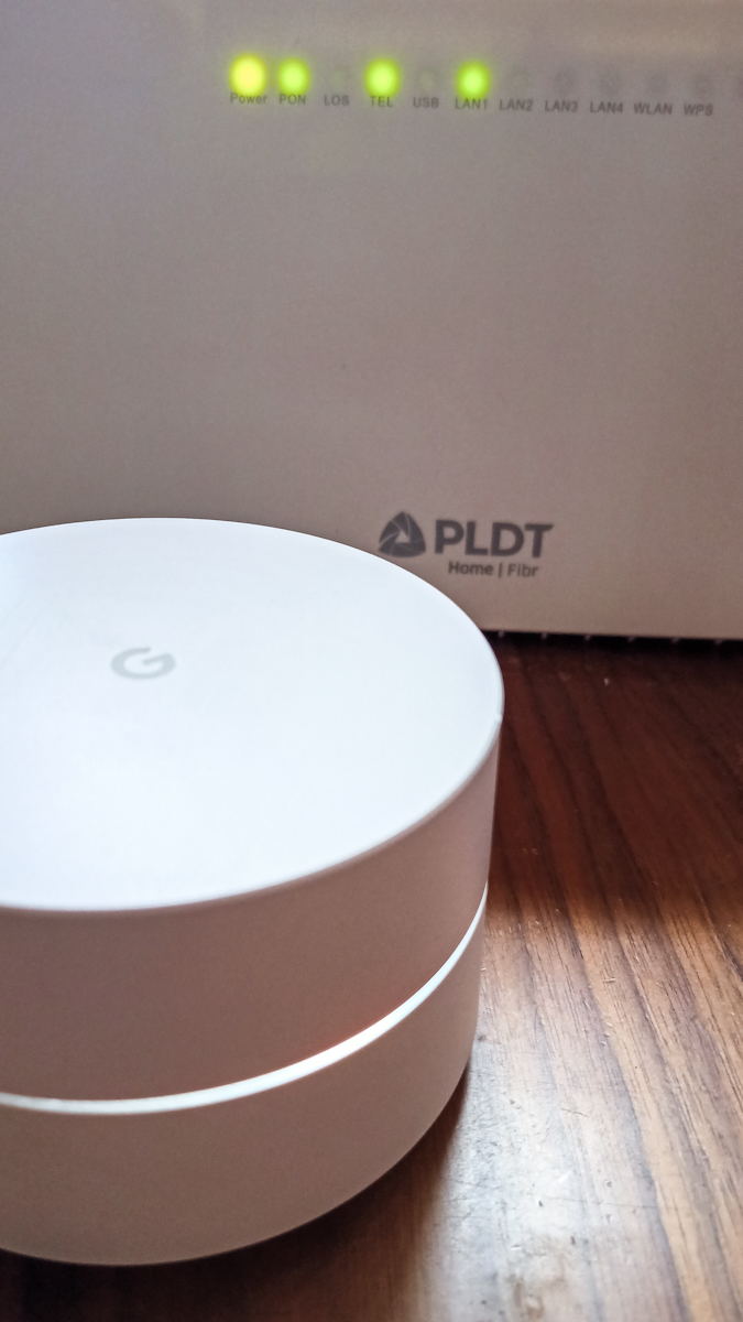 What does PLDT's WiFi Mesh System do